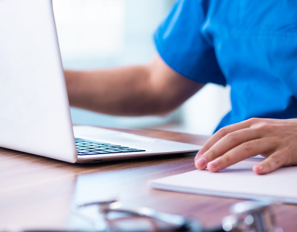 Doctor on laptop