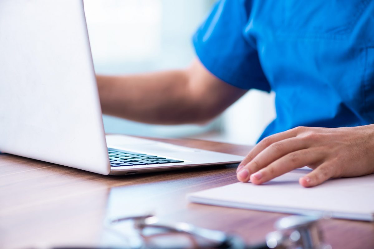 Doctor on laptop