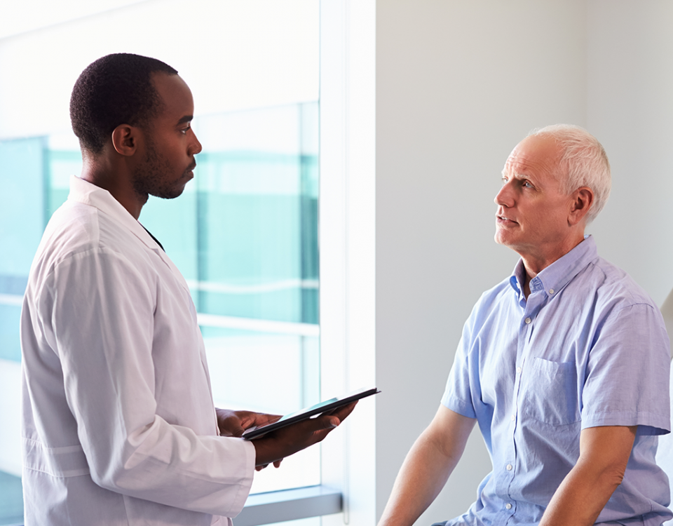 Doctor with male patient