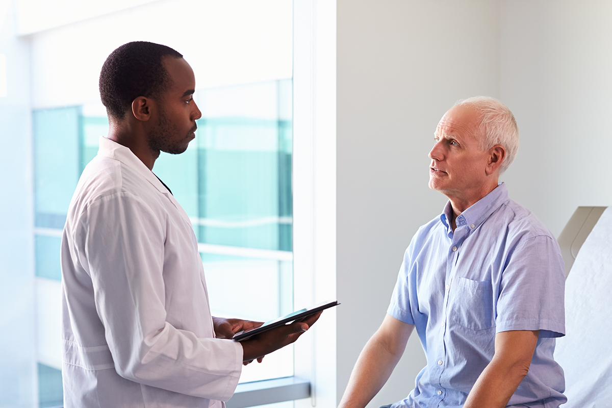 Doctor with male patient