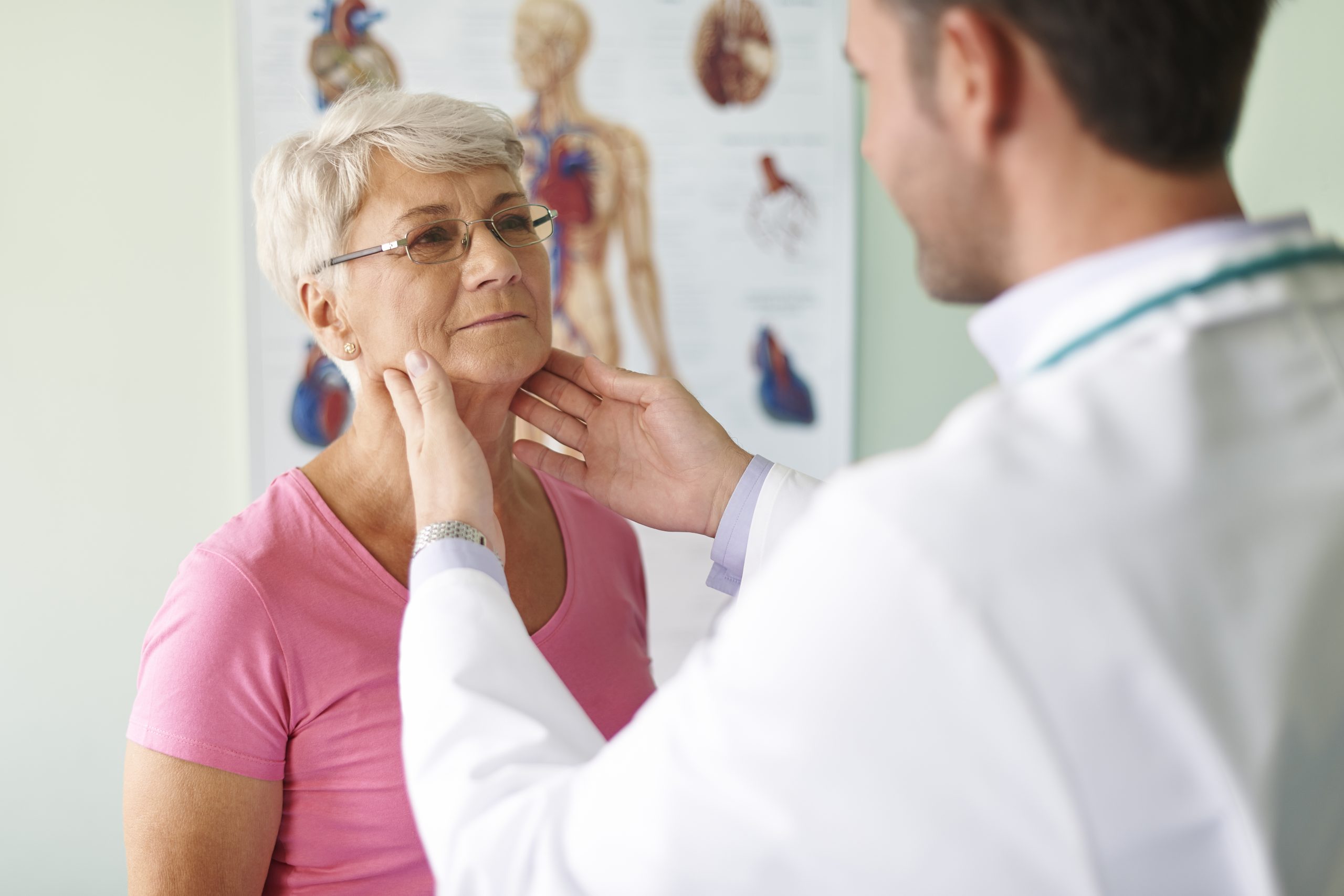 Older patient throat exam