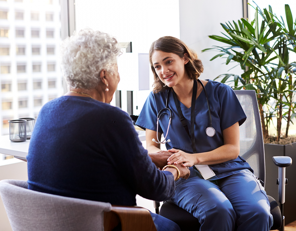 Patient and doctor talking in office