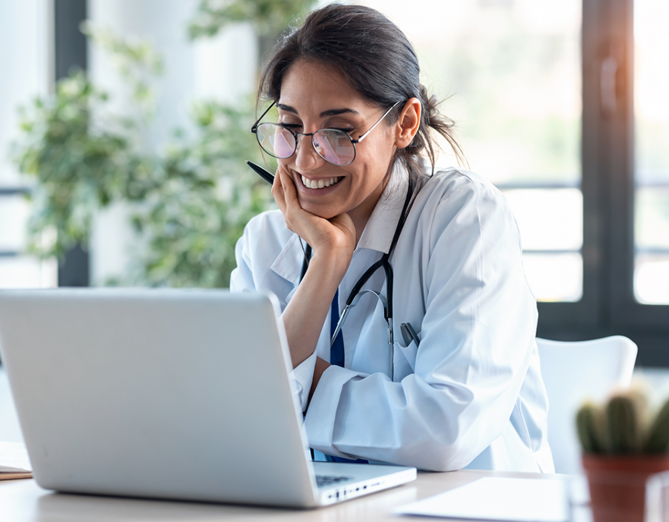 Female doctor on laptop