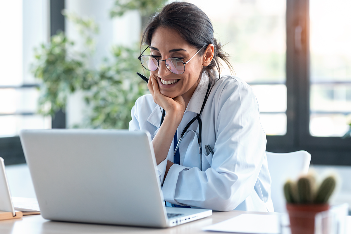 Female doctor on laptop