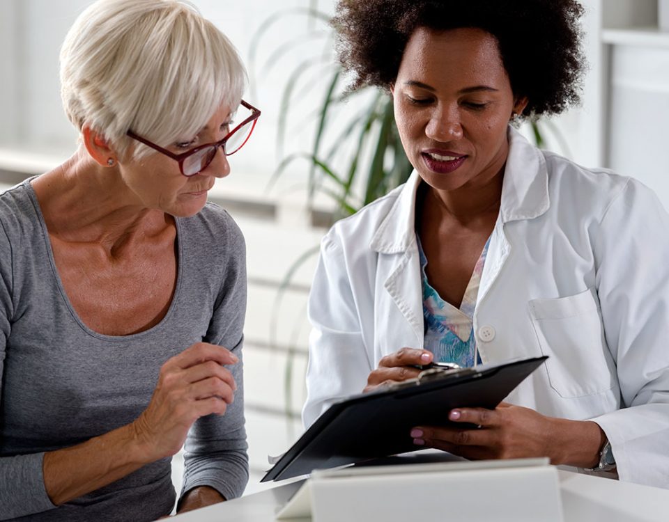 Doctor and patient reviewing test results