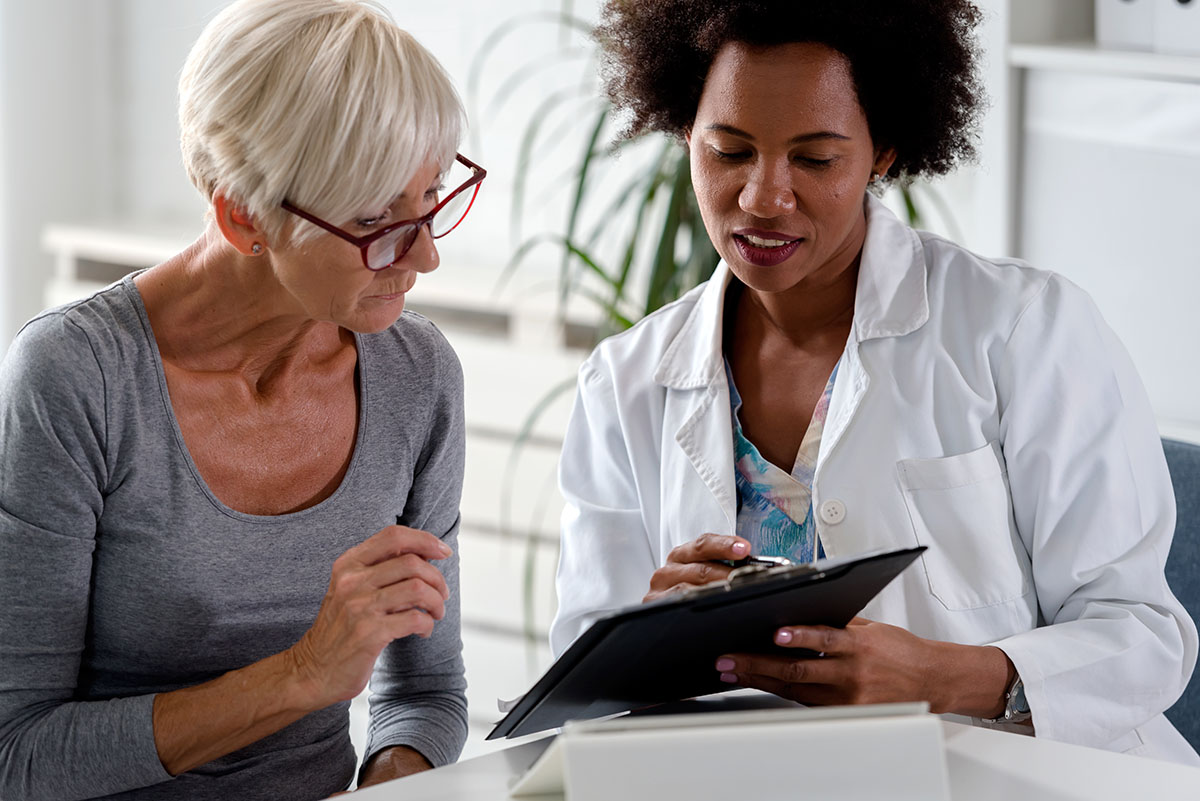 Doctor and patient reviewing test results