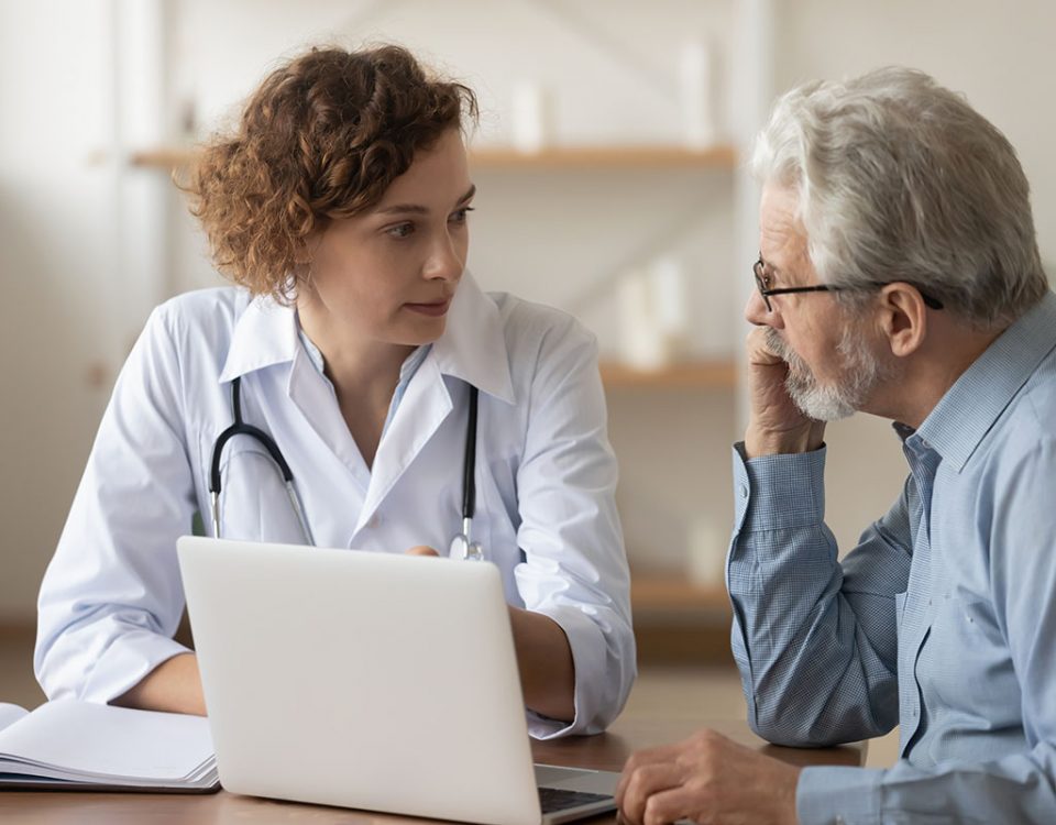 Doctor patient consult over laptop
