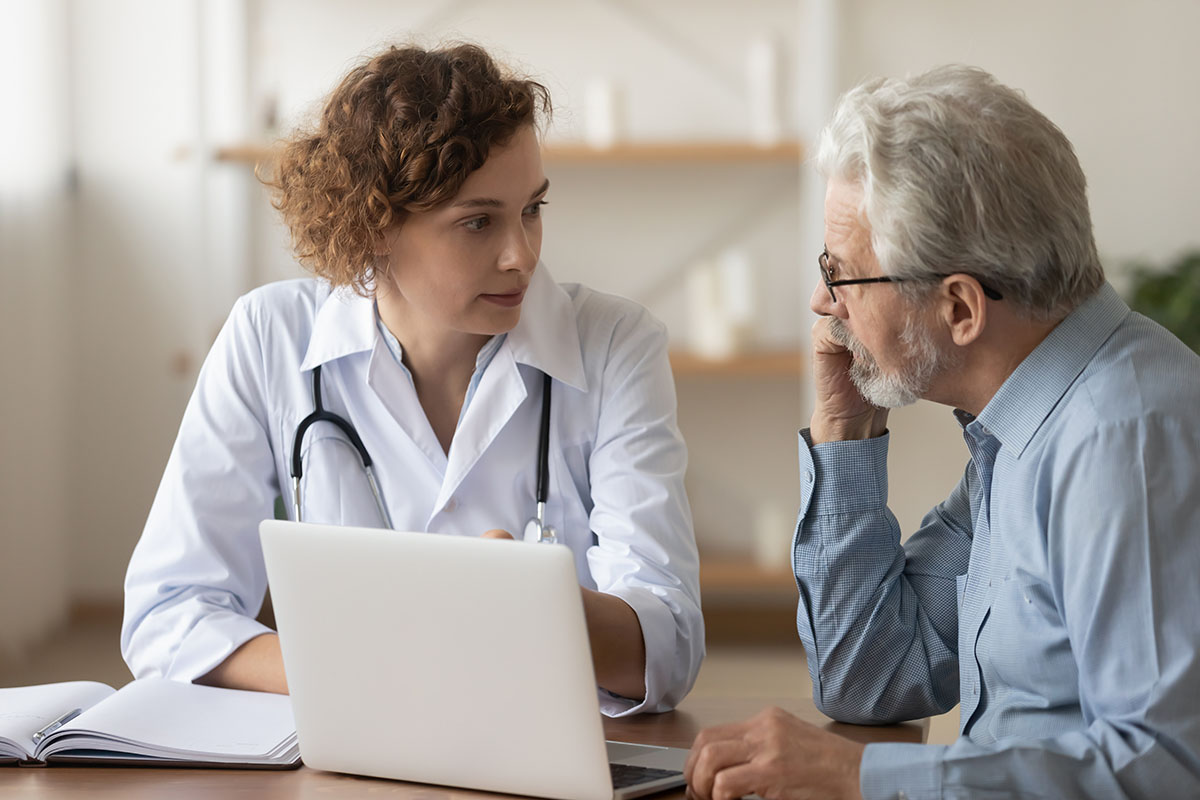 Doctor patient consult over laptop