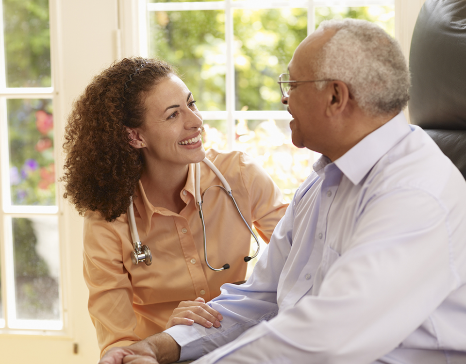 Doctor talking with patient