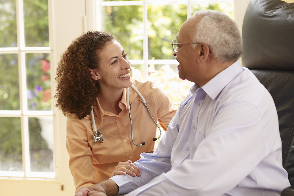 Doctor talking with patient