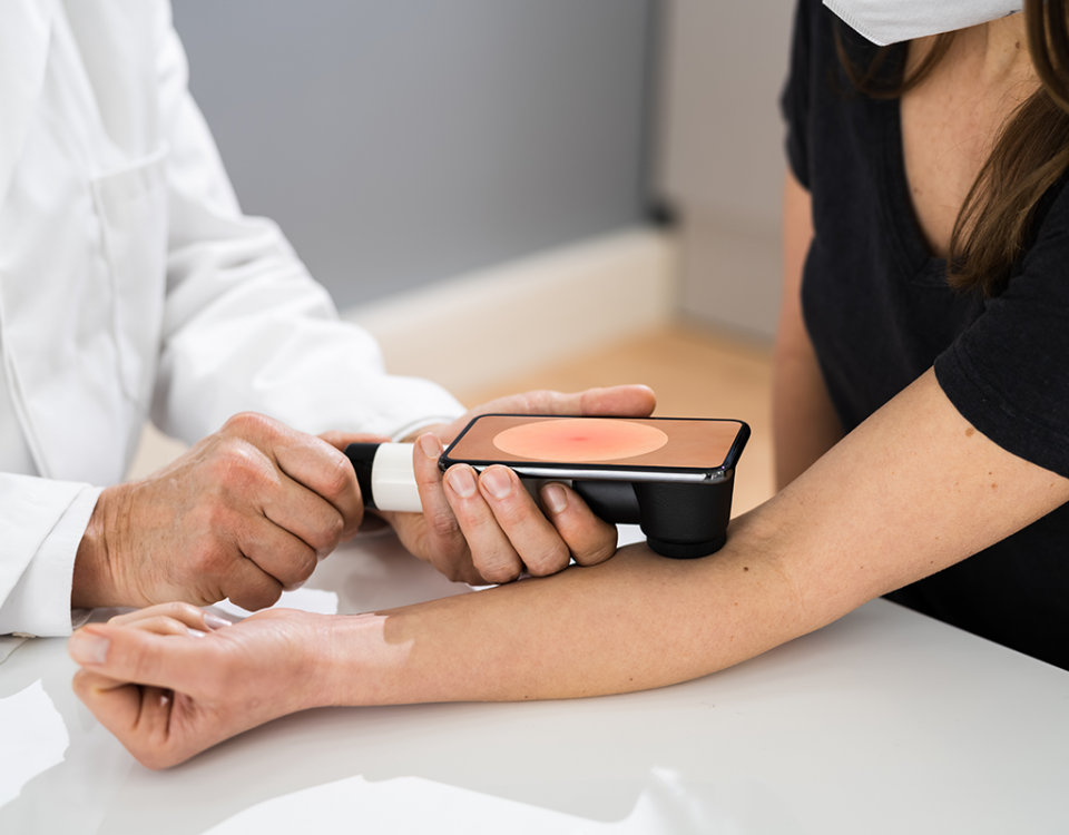Doctor conducing skin exam