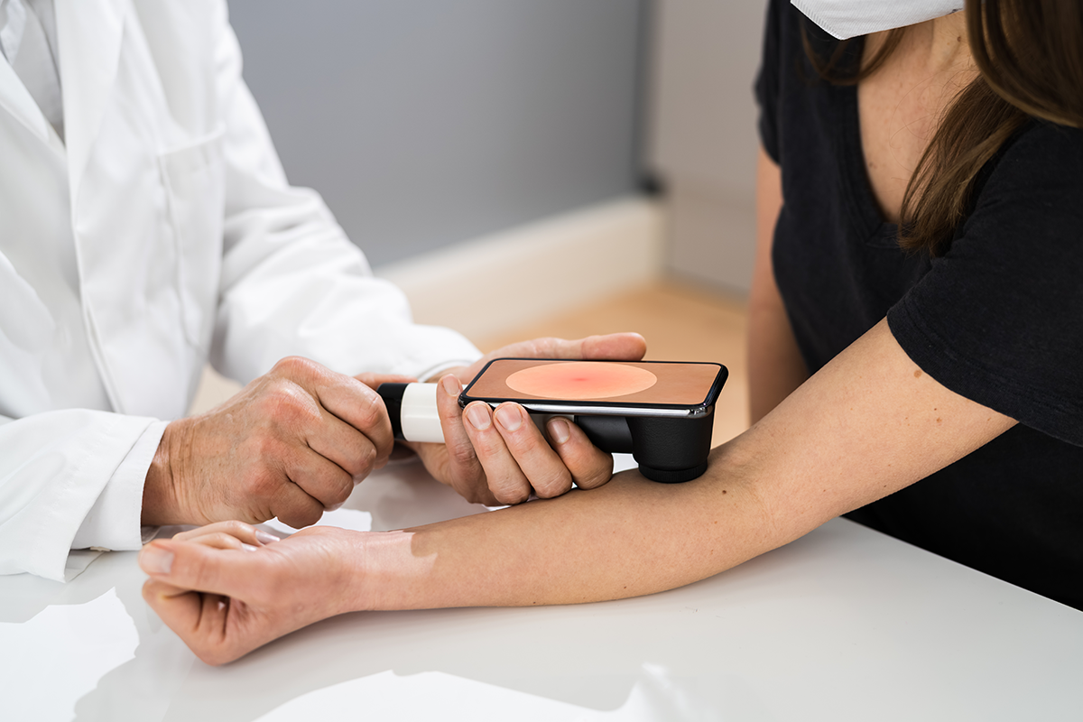 Doctor conducing skin exam