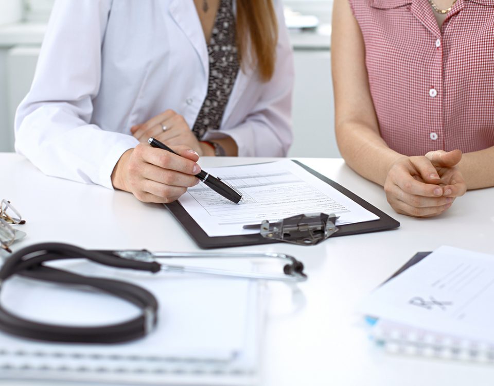 Doctor and patient completing survey