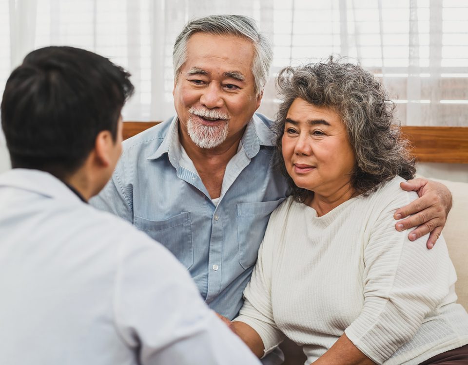 Couple speaking to doctor