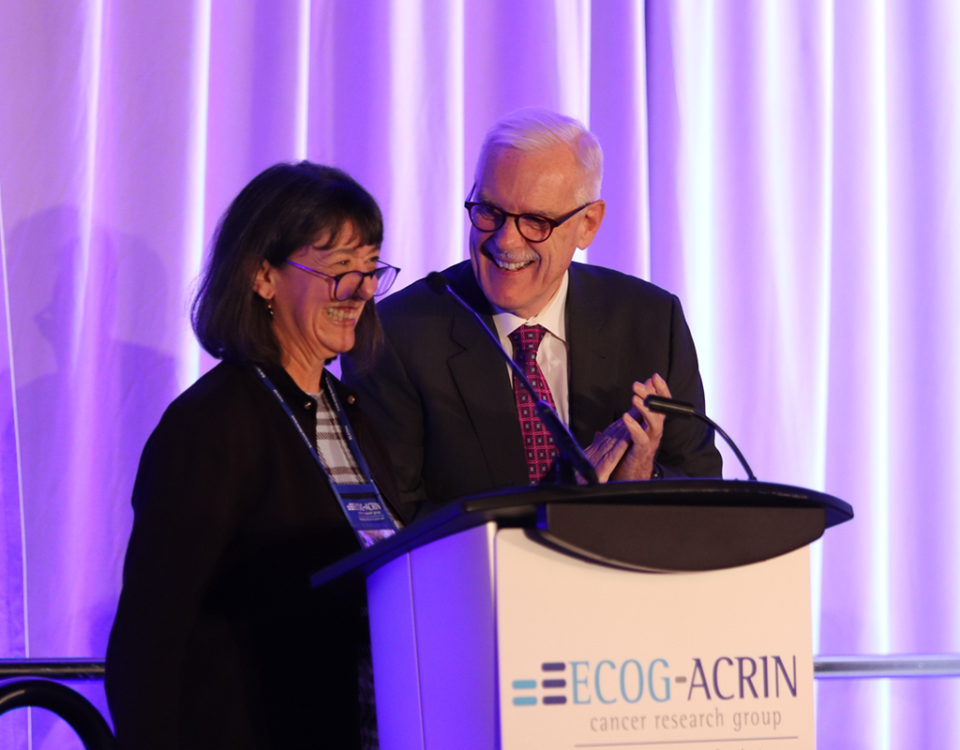 Two doctors at podium