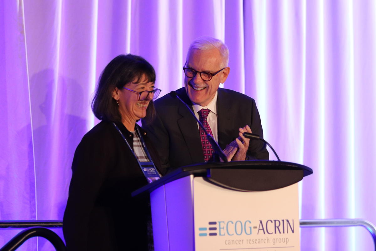 Two doctors at podium