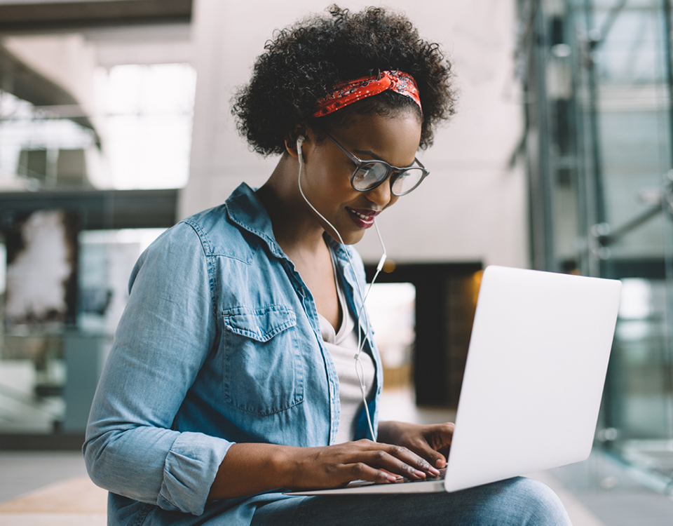 Young Black woman on laptop